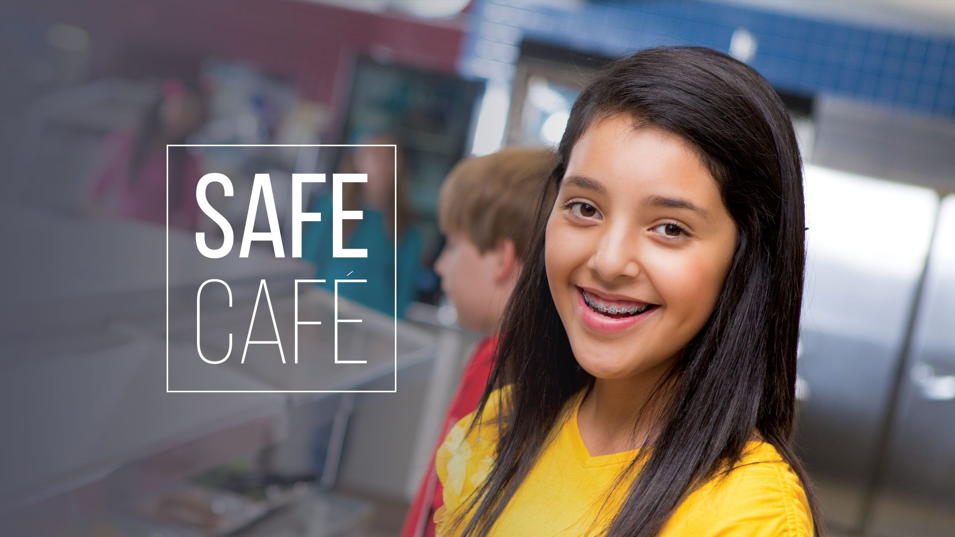 Middle school child in lunch line with Safe Cafe logo